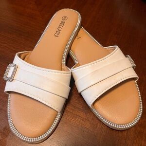 Little girl slides size 2